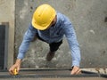 Builders installing measuring container Royalty Free Stock Photo