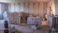 Builders laying brick walls inside appartment with professional timelapse. Royalty Free Stock Photo
