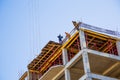Builders on a top Royalty Free Stock Photo