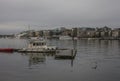 Buildigns of Aker Brigger, Oslo, Norway - cloudy evening and dark waters. Royalty Free Stock Photo