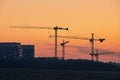Building activity on contruction site at sunrise