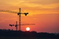 Building activity on contruction site at sunrise