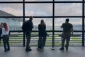 Silhouette passenger at Istanbul Airport smoking area