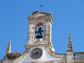 Arco da Vila, gate to the old town of Faro in Portugal, historic building with stork nest Royalty Free Stock Photo