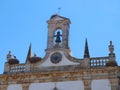 Arco da Vila, gate to the old town of Faro in Portugal, historic building with stork nest Royalty Free Stock Photo