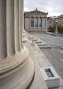 The building of the Athens Academy a marble column with a sculptures of Apollo and Athena, Socrates and Plato against a with