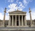 The building of the Athens Academy a marble column with a sculptures of Apollo and Athena, Socrates and Plato against a with Royalty Free Stock Photo