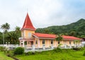 The building on the background of a mountain landscape, Raiatea island, French Polynesia. Copy space for text