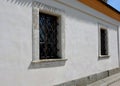 building of a baroque house with bars in the windows. a repeating Royalty Free Stock Photo