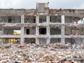Building being demolished in Bucharest, Romania. Concrete remains and rubble on a construction site