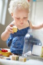 The building blocks of development. A sweet little baby girl playing with wooden blocks. Royalty Free Stock Photo