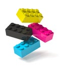 Building blocks of four printing process colors flying 3D
