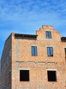 Building brick house construction wall with windows installation