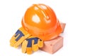 Building bricks, hard hat and gloves Royalty Free Stock Photo