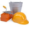 Building bricks, hard hat, trowel and a bucket Royalty Free Stock Photo
