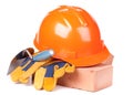 Building bricks, hard hat, trowel and gloves Royalty Free Stock Photo