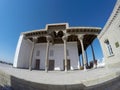 Building with bright columns and painted ceilings in Memorial complex of Naqshbandi: Pilgrimage site near Bukhara