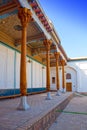 Building with bright columns and painted ceilings in Memorial complex of Naqshbandi: Pilgrimage site near Bukhara, Uzbekistan