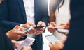 Building a business network in the age of the internet. Cropped shot of a group of businesspeople standing in a circle Royalty Free Stock Photo