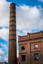 Building with chimney with blue sky and clouds Royalty Free Stock Photo
