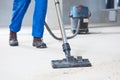 Building cleaning service. dust removal with vacuum cleaner