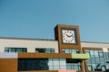 Building clock roof mirrored windows colored facade