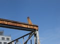 Building. Close-up of a construction crane against the blue sky Royalty Free Stock Photo