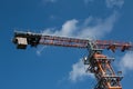 Building. Close-up of a construction crane against the blue sky Royalty Free Stock Photo