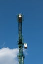Close-up of a construction crane against the blue sky Royalty Free Stock Photo