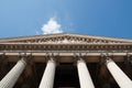 Building with columns in downtown Paris Royalty Free Stock Photo