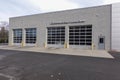Building with a commercial vehicle repair shop with four garage doors