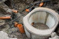 Building concrete sewage tank, flowing water trough orange pipes