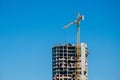 Construction crane near Building construction Royalty Free Stock Photo