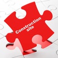 Building construction concept: Construction Site on puzzle background Royalty Free Stock Photo