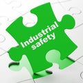 Building construction concept: Industrial Safety on puzzle background Royalty Free Stock Photo