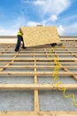 Building construction process of new wooden roof on wood frame house Royalty Free Stock Photo