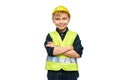 little boy in protective helmet and safety vest Royalty Free Stock Photo