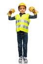 little boy in gloves, safety vest and helmet Royalty Free Stock Photo