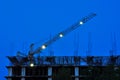 Building and construction in progress with crane. Royalty Free Stock Photo