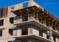 Building construction site against blue sky, close-up Royalty Free Stock Photo