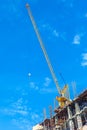 Building construction site with crane tower machinery Royalty Free Stock Photo