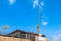 Building construction site with crane tower machinery Royalty Free Stock Photo