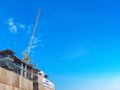 Building construction site with crane tower machinery Royalty Free Stock Photo