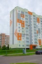 Building and Construction site of new homes. Facade of many story new houses under constructions.