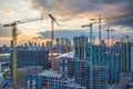 Building construction site with tower crane machinery Royalty Free Stock Photo