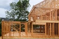 Building construction, wood framing new home under construction roof being built Royalty Free Stock Photo