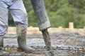 Building construction worker pouring cement Royalty Free Stock Photo