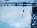 Building crane and building under construction against blue sky Royalty Free Stock Photo