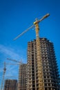 Building crane and building under Royalty Free Stock Photo