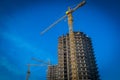 Building crane and building under Royalty Free Stock Photo